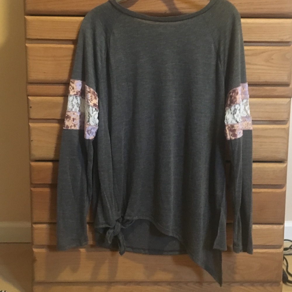 Size large long sleeve. Never been worn